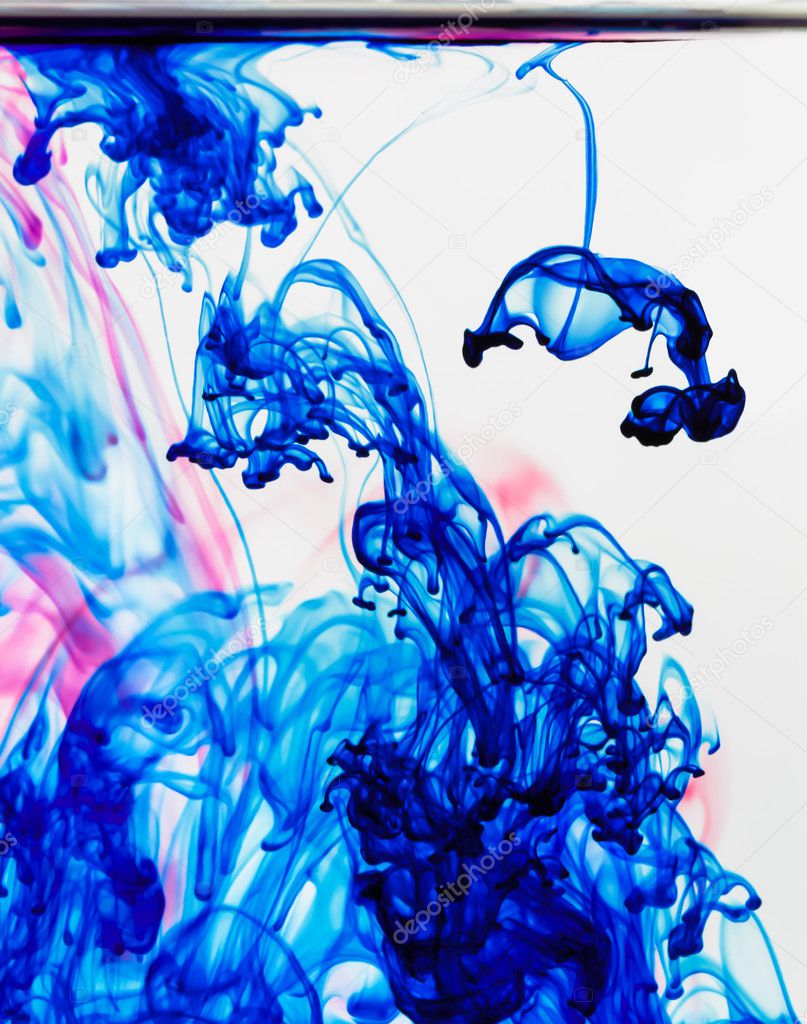 Liquid blue and red  dye in motion
