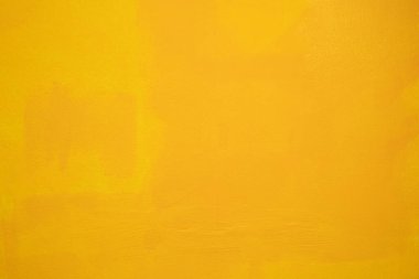 Boyalı Sarı renkli beton arka planda soyut boyama dokusu.