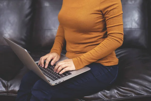 Work from home,women use notebook computers to contact to buy - sell products online.