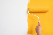 Картина, постер, плакат, фотообои "the mechanic is painting yellow on the wall.", артикул 371210358