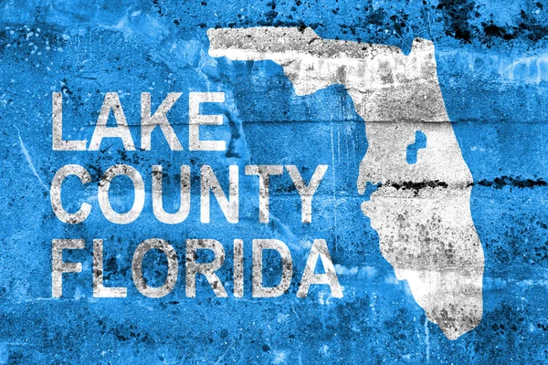 Flag of Lake County, Florida, USA, painted on dirty wall