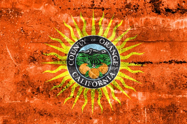 Flaga z Orange County, California, Usa, malowane na brudne ściany — Zdjęcie stockowe