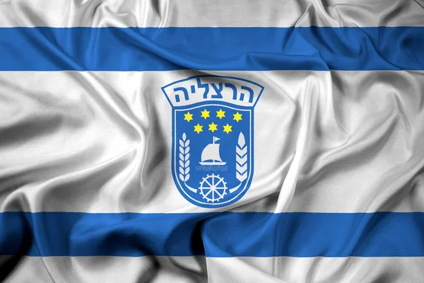 Viftande flagga Herzliya City, Israel — Stockfoto