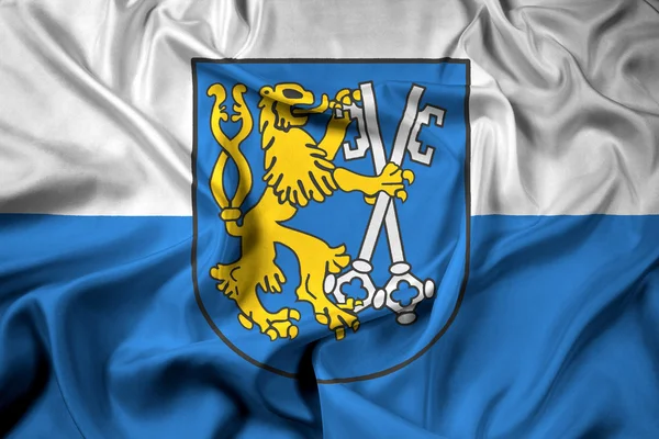 Розмахуючи прапором Легниця з гербом, Польща — стокове фото