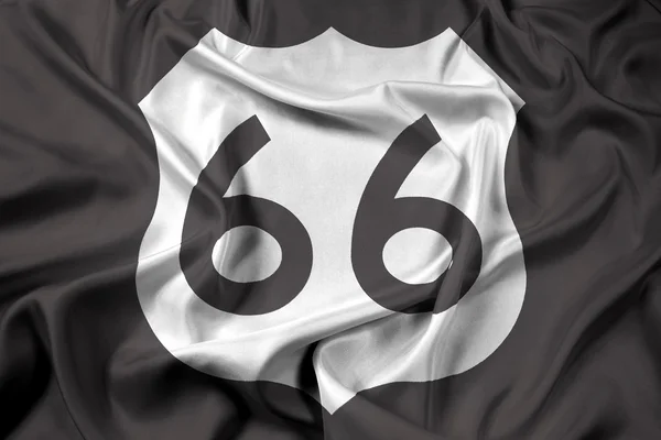 Macha flagą USA Route 66 (nas 66 lub Route 66) — Zdjęcie stockowe