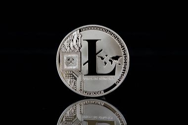 Physical version of Litecoin, new virtual money. Conceptual image for worldwide cryptocurrency and digital payment system called the first decentralized digital currency. clipart