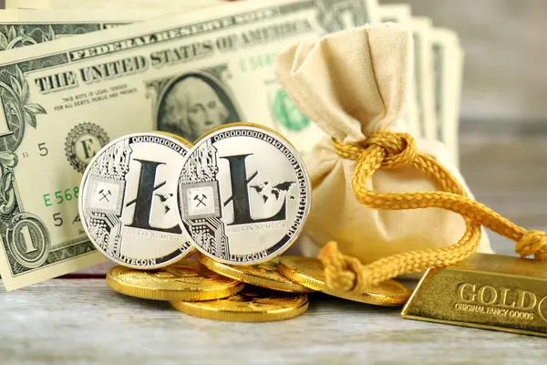 Physical version of Litecoin, new virtual money. Conceptual image for investors in cryptocurrency, gold and dollars. — Stock Photo, Image