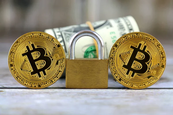 Physical version of Bitcoin (new virtual money), golden padlock and banknotes of one dollar. Conceptual image for money and cryptocurrency security. — Stock Photo, Image