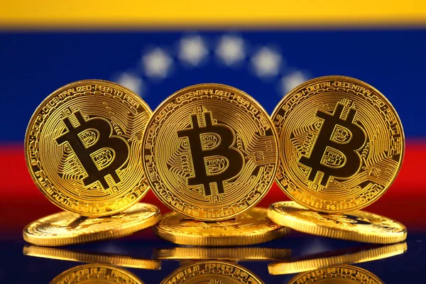 Physical version of Bitcoin (new virtual money) and Venezuela Flag. Conceptual image for investors in cryptocurrency and Blockchain Technology in Venezuela. — Stock Photo, Image