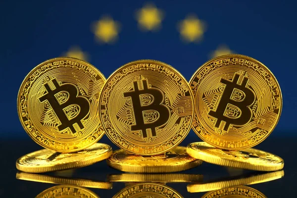 Physical version of Bitcoin (new virtual money) and EU Flag. Conceptual image for investors in cryptocurrency and Blockchain Technology in European Union. — Stock Photo, Image