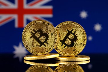 Bitcoin ve Avustralya bayrağı fiziksel sürümü. Yakın çekim.