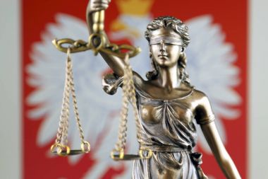 Symbol of law and justice with Poland Flag. Close up. clipart