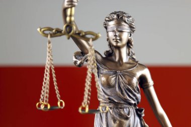 Symbol of law and justice with Poland Flag. Close up. clipart