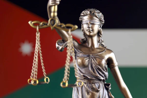 Symbol of law and justice with Jordan Flag. Close up.