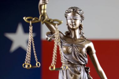 Hukuk ve adalet Texas devlet bayrağı ile sembolü. Yakın çekim.