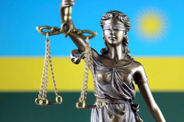 法律和正义的标志与卢旺达旗子 — 图库照片