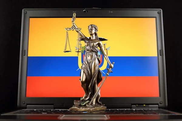 Symbol of law and justice with Ecuador Flag on laptop. Studio shot.