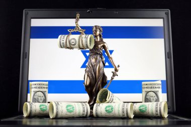 Symbol of law and justice, banknotes of one dollar and Israel Flag on laptop. Studio shot. clipart
