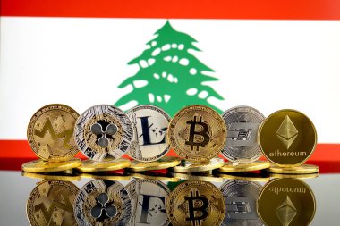 Fiziksel sürümü Cryptocurrencies (Monero, dalgalanma, Litecoin, Bitcoin, çizgi, Ethereum) ve Lübnan Bayrağı.