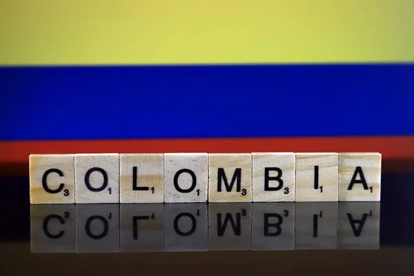 Colombia Flag Country Name Made Small Wooden Letters Studio Shot — Stock Photo, Image