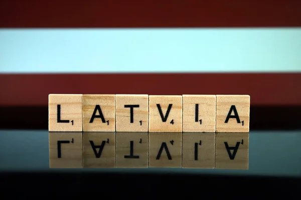 Latvia Flag Country Name Made Small Wooden Letters Studio Shot — Stok fotoğraf