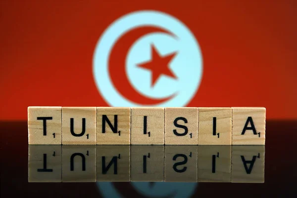 Tunísia Bandeira País Nome Feito Pequenas Letras Madeira Estúdio — Fotografia de Stock