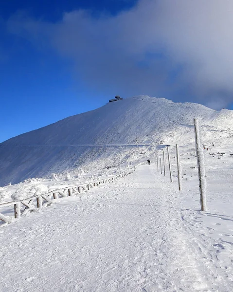 KARPACZ, POLAND - MARCH 08, 2020: Snezka or Sniezka (in Czech and Polish) is a mountain on the border between the Czech Republic and Poland, Karkonosze National Park, Poland, Europe.