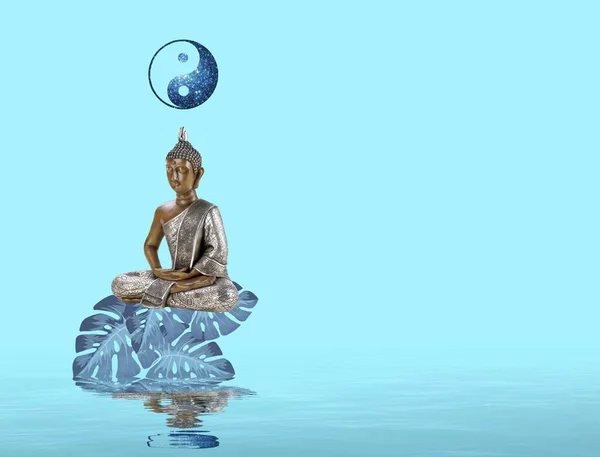 Spiritual background for meditation with yin yang symbol, zen stone and buddha statue isolated in color background