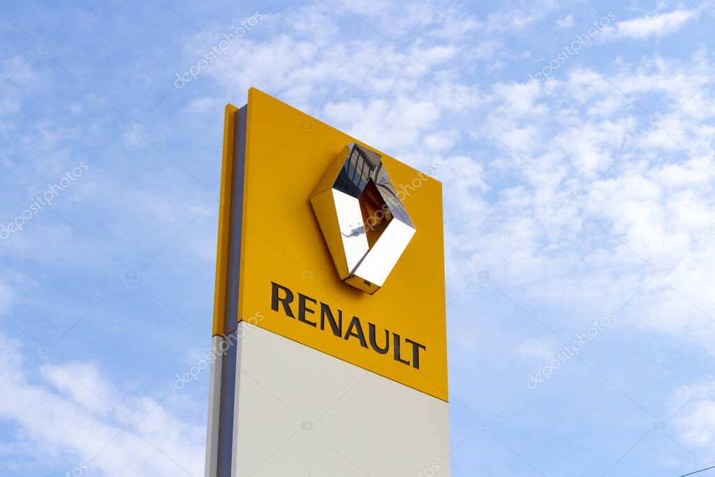 Veliky Novgorod, Russia - August 23, 2019: Sign of a car dealership of the French manufacturer Renault against a summer day.
