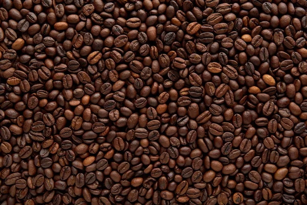 Grãos de café fundo. Contexto dos grãos de café torrados — Fotografia de Stock