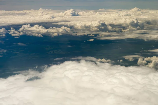 The top view on clouds from an airplane window — Stock Photo, Image