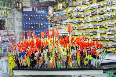 Fishing tackle with colored floats close-up in a fishing shop Russia, Kursk region, Zheleznogorsk October 2019