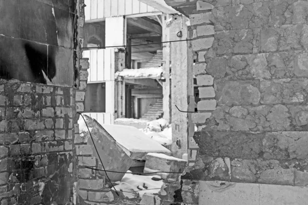 Remains of the destroyed industrial building. Black and white image — 스톡 사진