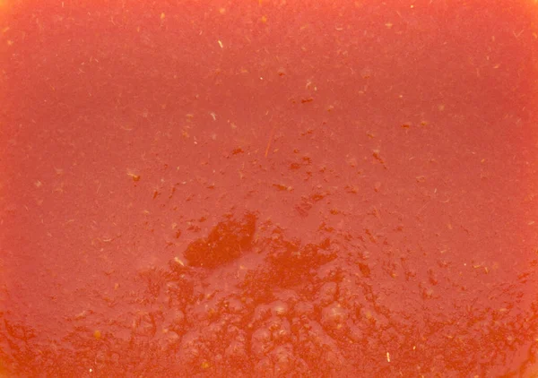 長方形の形でパルプとトマトジュースの質感 赤は温かみのある色調で オレンジ色がかった色合い — ストック写真