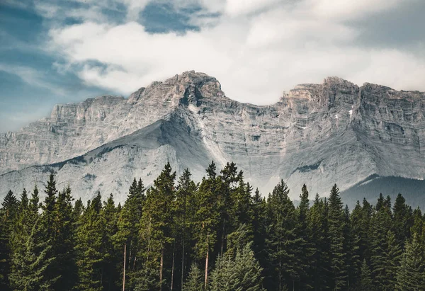 Empty street with mountain panorama in Banff National Park, Cana