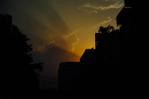 Sunset through old crumbling building in Yangon Myanmbar Burma