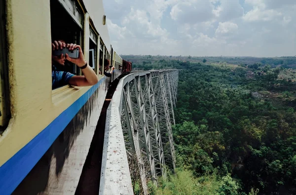 The GOKTEIK VIADUCT is a railroad bridge in Myanmar with Train a — Stock Photo, Image