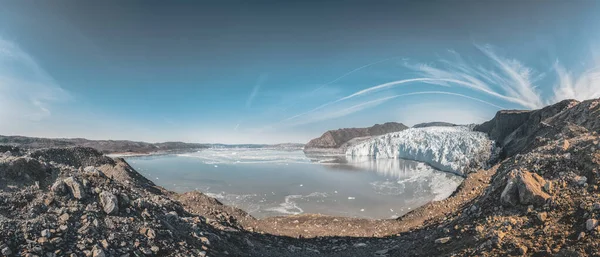 Panoramic image of Eqip Sermia, Eqi Glacier in Greenland Disko Bay. Boat trip in the morning over the arctic sea,Baffin Bay, calving glacier. Ice breaking of on a blue sky wth clouds. — Stock Photo, Image