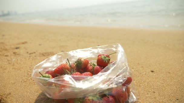 Strawberry on the beach, sea. 4k, slow motion — Stock Video