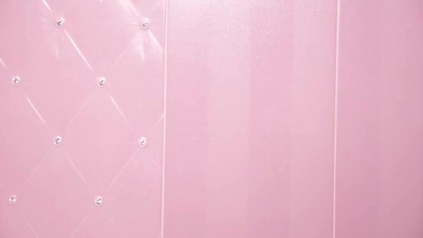 Pink ceramic tile with rhinestones in the bathroom, texture, background. 4k, slow motion — Stock Video