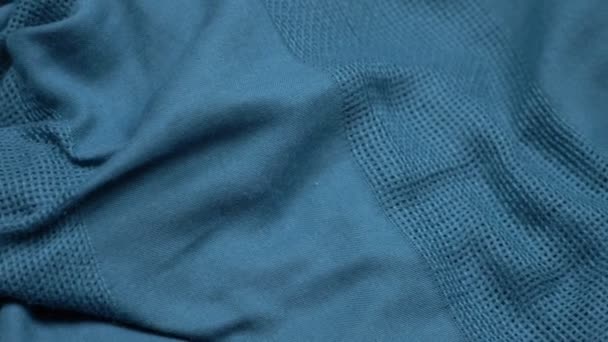 Tessuto texture sfondo. le pieghe di un tessuto di cotone blu. copia spazio — Video Stock