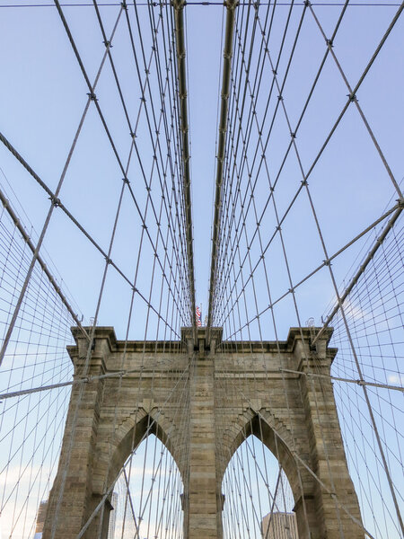 View of the gothic arches of the Brooklyn Bridge.
