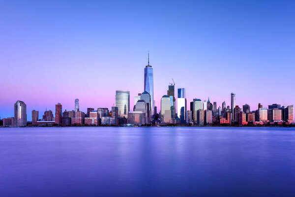 New York skyline as viewed across the Hudson River in New Jersey at sunset.