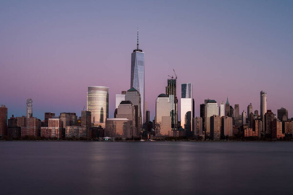 New York skyline as viewed across the Hudson River in New Jersey at sunset.