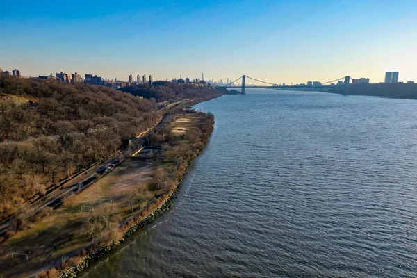 George Washington Bridge and the upper west side of Manhattan along the Hudson River.