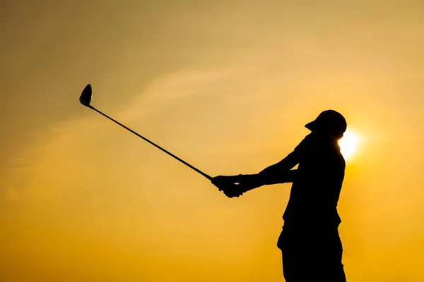 Силуэт гольф-драйва — стоковое фото