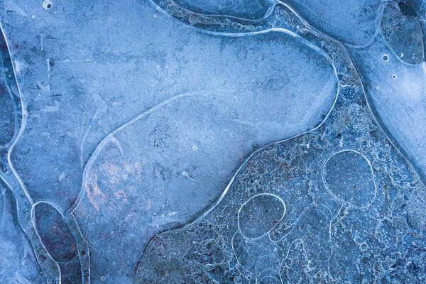 Forms and shapes of ice on a lake