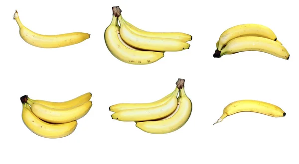 Zestaw żółte banany na białym tle — Zdjęcie stockowe