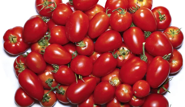 Few red tomatoes isolated — Stock Photo, Image