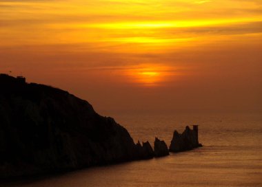 Gün batımında iğneler